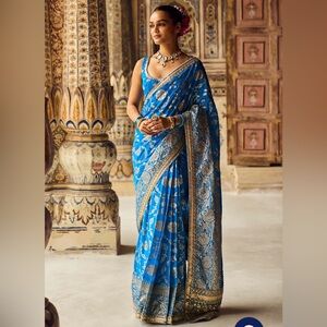 Elegant Blue Saree with Gold Accents
